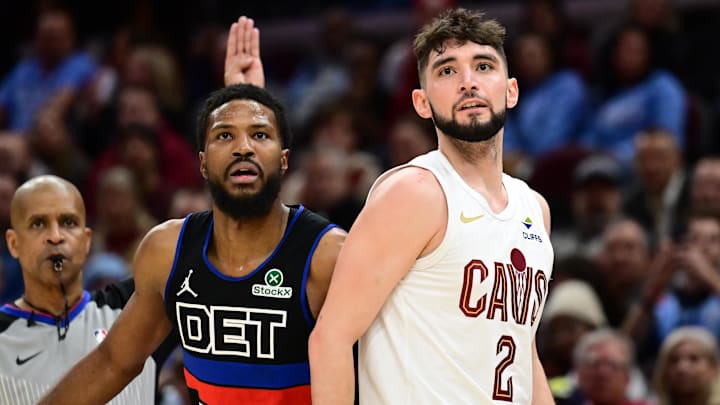Jan 27, 2025; Cleveland, Ohio, USA; Detroit Pistons guard Malik Beasley (5) and Cleveland Cavaliers guard Ty Jerome (2) watch Jerome’s shot during the second half at Rocket Mortgage FieldHouse.
