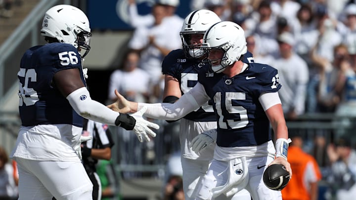 Penn State football quarterback Drew Allar (15) celebrates with his teammates