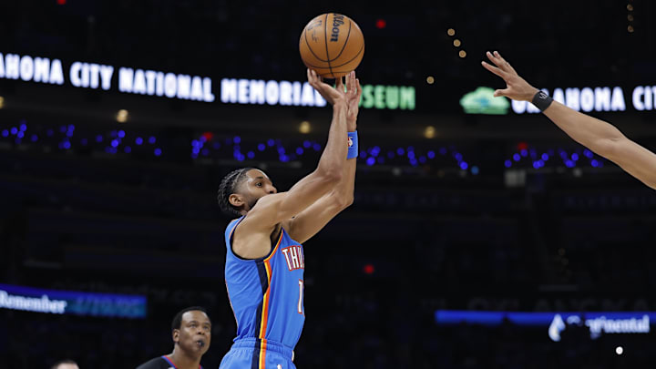 Apr 19, 2026; Oklahoma City, Oklahoma, USA; Oklahoma City Thunder guard Isaiah Joe (11) shoots a three point basket against the Phoenix Suns in the second half during game one of the first round of the 2026 NBA Playoffs at Paycom Center. Mandatory Credit: Alonzo Adams-Imagn Images