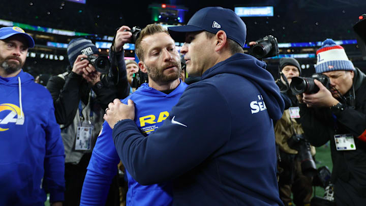 Jan 25, 2026; Seattle, WA, USA; Seattle Seahawks head coach Mike MacDonald greets Los Angeles Rams head coach Sean McVay on field after the 2026 NFC Championship Game at Lumen Field. Mandatory Credit: Kevin Ng-Imagn Images