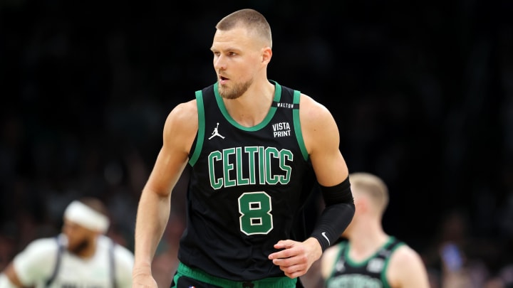 Jun 9, 2024; Boston, Massachusetts, USA; Boston Celtics center Kristaps Porzingis (8) reacts after a play against the Dallas Mavericks during the first quarter in game two of the 2024 NBA Finals at TD Garden. Mandatory Credit: Peter Casey-USA TODAY Sports