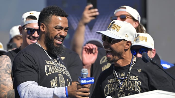 Nov 1, 2024; Los Angeles, CA, USA;  Los Angeles Dodgers left fielder Teoscar Hernandez (37) and right fielder Mookie Betts (50) during the World Series Championship Celebration at Dodger Stadium.