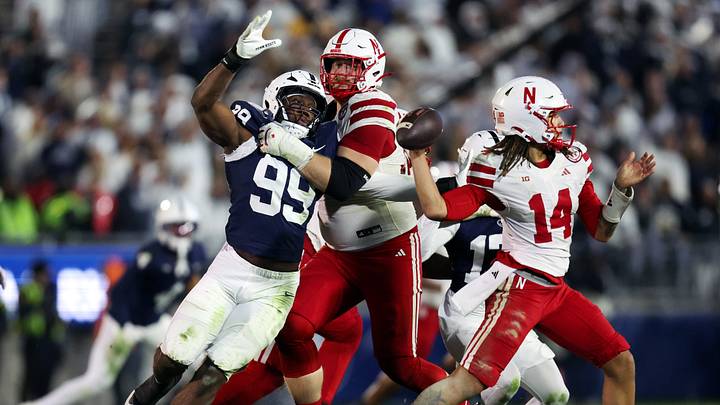 Nov 22, 2025; University Park, Pennsylvania, USA; Penn State Nittany Lions defensive end Yvan Kemajou (99) pressures Nebraska Cornhuskers quarterback TJ Lateef (14) during the fourth quarter at Beaver Stadium. Mandatory Credit: Matthew O'Haren-Imagn Images Nov 22, 2025; University Park, Pennsylvania, USA; Penn State Nittany Lions defensive end Yvan Kemajou (99) pressures Nebraska Cornhuskers quarterback TJ Lateef (14) during the fourth quarter at Beaver Stadium. Mandatory Credit: Matthew O'Haren-Imagn Images