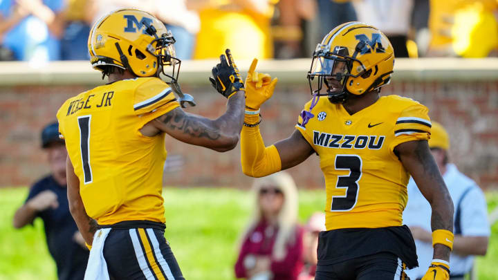 Oct 21, 2023; Columbia, Missouri, USA; Missouri Tigers wide receiver Luther Burden III (3) celebrates with wide receiver Theo Wease Jr. (1) after scoring a touchdown against the South Carolina Gamecocks during the first half at Faurot Field at Memorial Stadium. Mandatory Credit: Jay Biggerstaff-USA TODAY Sports Oct 21, 2023; Columbia, Missouri, USA; Missouri Tigers wide receiver Luther Burden III (3) celebrates with wide receiver Theo Wease Jr. (1) after scoring a touchdown against the South Carolina Gamecocks during the first half at Faurot Field at Memorial Stadium. Mandatory Credit: Jay Biggerstaff-USA TODAY Sports