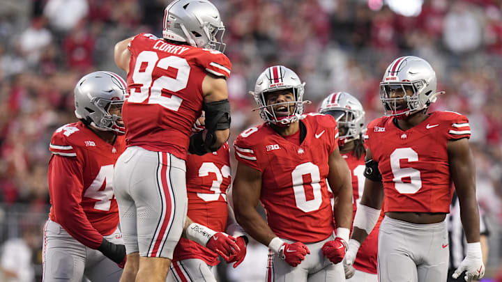 Sep 7, 2024; Columbus, Ohio, USA;  Ohio State Buckeyes linebacker Cody Simon (0) celebrates with teammates after a sack against the Western Michigan Broncos during the first half at Ohio Stadium. Mandatory Credit: Adam Cairns-Imagn Images