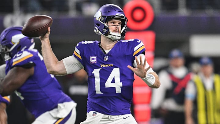Nov 3, 2024; Minneapolis, Minnesota, USA; Minnesota Vikings quarterback Sam Darnold (14) throws a pass against the Indianapolis Colts during the first quarter at U.S. Bank Stadium. Mandatory Credit: Jeffrey Becker-Imagn Images