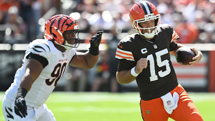 Sep 7, 2025; Cleveland, Ohio, USA; Cleveland Browns quarterback Joe Flacco (15) scrambles from Cincinnati Bengals defensive tackle Kris Jenkins Jr. (90) during the fourth quarter at Huntington Bank Field. Mandatory Credit: Ken Blaze-Imagn Images