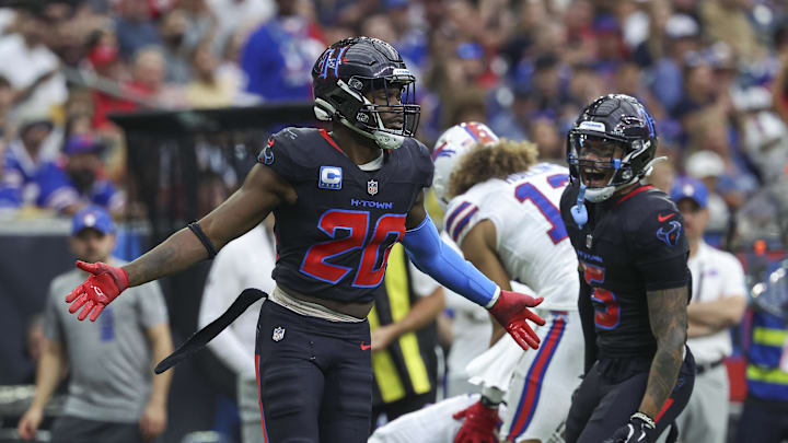 Oct 6, 2024; Houston, Texas, USA; Houston Texans safety Jimmie Ward (20) reacts after making a tackle during the second quarter against the Buffalo Bills at NRG Stadium. Mandatory Credit: Troy Taormina-Imagn Images
