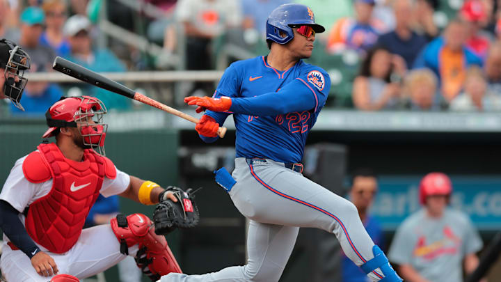 Feb 24, 2025; Jupiter, Florida, USA; New York Mets right fielder Juan Soto (22) hits a single against the St. Louis Cardinals during the third inning at Roger Dean Chevrolet Stadium. Feb 24, 2025; Jupiter, Florida, USA; New York Mets right fielder Juan Soto (22) hits a single against the St. Louis Cardinals during the third inning at Roger Dean Chevrolet Stadium.