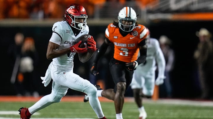 Cincinnati Bearcats wide receiver Xzavier Henderson (8) catches a pass across the middle for a first down in the first quarter of the NCAA Big12 football game between the Oklahoma State Cowboys and the Cincinnati Bearcats at Boone Pickens Stadium in Stillwater, Okla., on Saturday, Oct. 28, 2023.