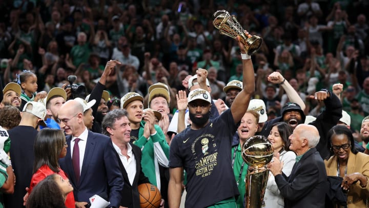 Jaylen Brown holds the NBA Finals MVP trophy