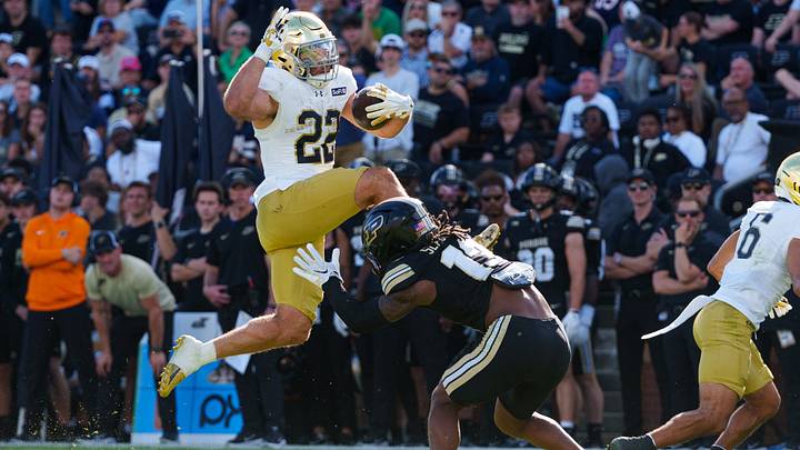 Notre Dame running back Aneyas Williams (22) hurdles Purdue defensive back John Slaughter (13) during a NCAA football game at Ross-Ade Stadium on Saturday, Sept. 26, 2026, in West Lafayette. Notre Dame running back Aneyas Williams (22) hurdles Purdue defensive back John Slaughter (13) during a NCAA football game at Ross-Ade Stadium on Saturday, Sept. 26, 2026, in West Lafayette.