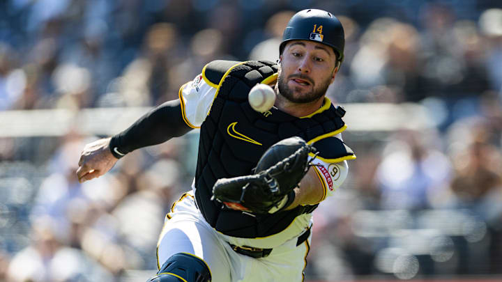 Apr 8, 2026; Pittsburgh, Pennsylvania, USA;  Pittsburgh Pirates catcher Joey Bart (14) dives and misses a foul ball by the San Diego Padres during the ninth inning at PNC Park. Mandatory Credit: Scott Galvin-Imagn Images