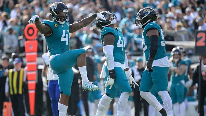 Jan 11, 2026; Jacksonville, FL, USA; Jacksonville Jaguars defensive end Josh Hines-Allen (41) celebrates a sack during the second half against the Buffalo Bills in an AFC Wild Card Round game at EverBank Stadium. Mandatory Credit: Melina Myers-Imagn Images