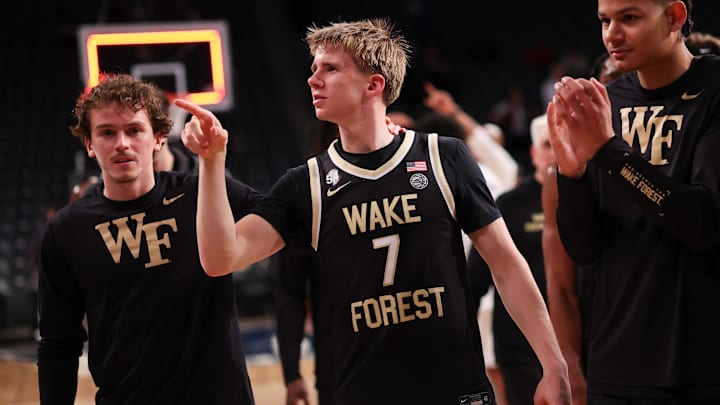Feb 11, 2026; Atlanta, Georgia, USA; Wake Forest Demon Deacons guard Isaac Carr (7) celebrates after a victory over the Georgia Tech Yellow Jackets at McCamish Pavilion. Mandatory Credit: Brett Davis-Imagn Images