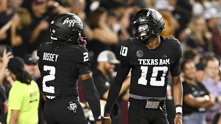 Texas A&M quarterback Marcel Reed and wide receiver Terry Bussey.