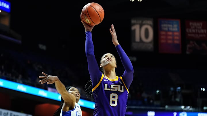 Dec 17, 2024; Uncasville, Connecticut, USA; LSU Lady Tigers forward Jersey Wolfenbarger (8) drives the ball to the basket against Seton Hall Pirates guard Amari Wright (22) in the first half at Mohegan Sun Arena. Mandatory Credit: David Butler II-Imagn Images