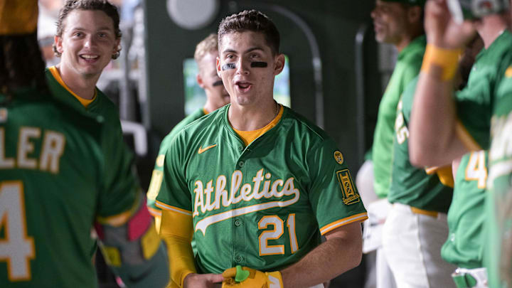 Aug 25, 2025; West Sacramento, California, USA; Athletics outfielder Tyler Soderstrom (21) celebrates with teammates after scoring against the Detroit Tigers in the seventh inning at Sutter Health Park. Mandatory Credit: Ed Szczepanski-Imagn Images