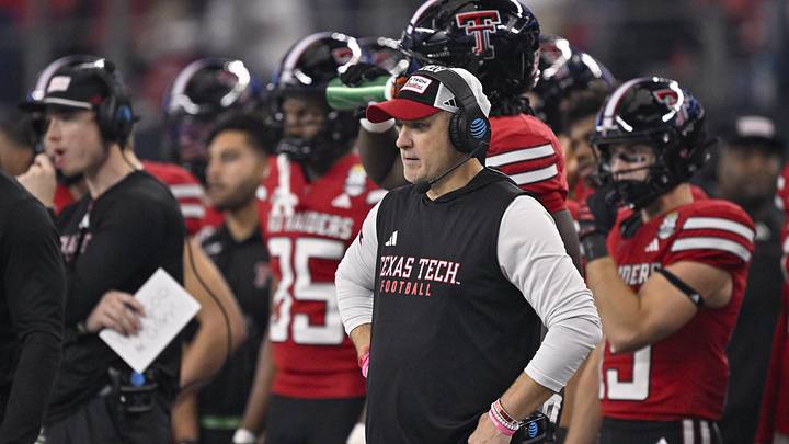 Dec 6, 2025; Arlington, TX, USA; Texas Tech Red Raiders head coach Joey McGuire looks on during the game between the Red Raiders and the Cougars at AT&T Stadium. Mandatory Credit: Jerome Miron-Imagn Images Dec 6, 2025; Arlington, TX, USA; Texas Tech Red Raiders head coach Joey McGuire looks on during the game between the Red Raiders and the Cougars at AT&T Stadium. Mandatory Credit: Jerome Miron-Imagn Images