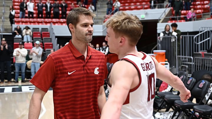 Jan 4, 2025; Pullman, Washington, USA; Washington State Cougars head coach David Riley (left) celebrates with guard Parker Gerrits (10) after a game against the San Francisco Dons at Friel Court at Beasley Coliseum. Washington State won 91-82. Mandatory Credit: James Snook-Imagn Images