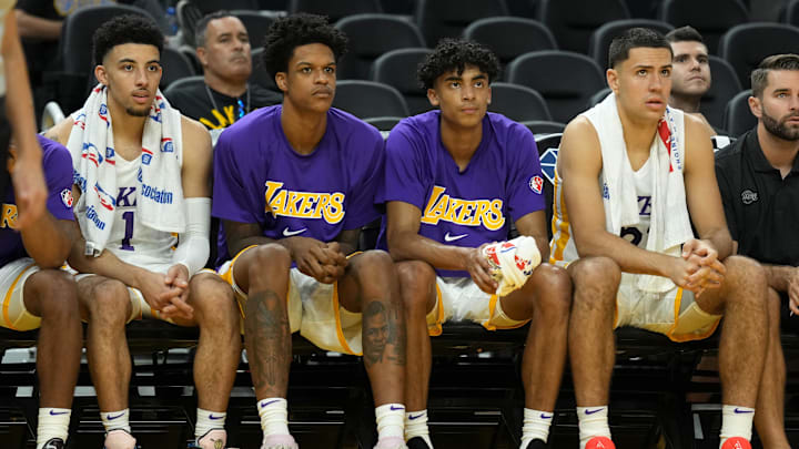 Jul 5, 2022; San Francisco, CA, USA: Los Angeles Lakers guard Scotty Pippen Jr. (1) sits on the bench with forward Shareef ONeal (45) and guard Max Christie (10) and forward Cole Swider (21) during the fourth quarter against the Sacramento Kings at the California Summer League at Chase Center. Mandatory Credit: Darren Yamashita-Imagn Images