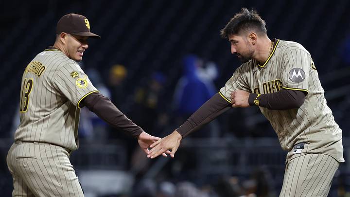 Apr 6, 2026; Pittsburgh, Pennsylvania, USA;  San Diego Padres third baseman Manny Machado (13) and designated hitter Nick Castellanos (right) celebrate after defeating the Pittsburgh Pirates at PNC Park. Mandatory Credit: Charles LeClaire-Imagn Images