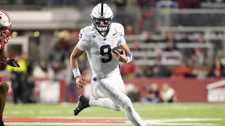 Penn State Nittany Lions quarterback Beau Pribula rushes with the football during the fourth quarter against the Wisconsin Badgers at Camp Randall Stadium. 