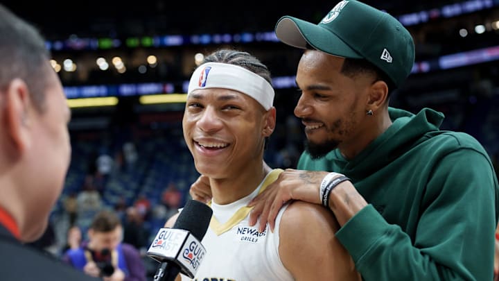 Feb 9, 2026; New Orleans, Louisiana, USA; New Orleans Pelicans guard Dejounte Murray hugs New Orleans Pelicans guard Jeremiah Fears (0) after the game against the Sacramento Kings at Smoothie King Center. Mandatory Credit: Matthew Hinton-Imagn Images