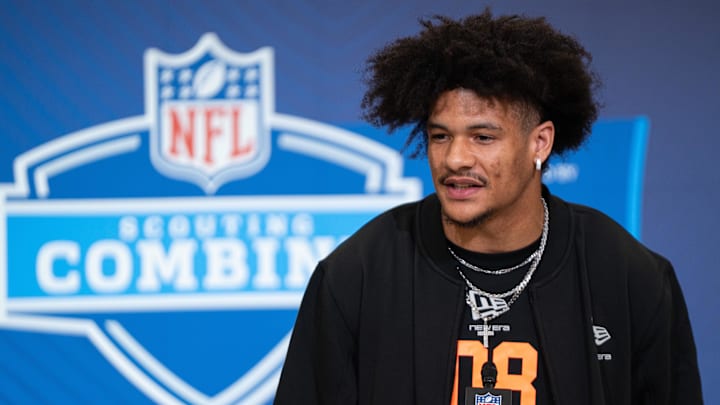 Feb 27, 2026; Indianapolis, IN, USA; Washington wideout Denzel Boston (WO08) speaks to members of the media during the NFL Combine at the Indiana Convention Center. Mandatory Credit: Jacob Musselman-Imagn Images