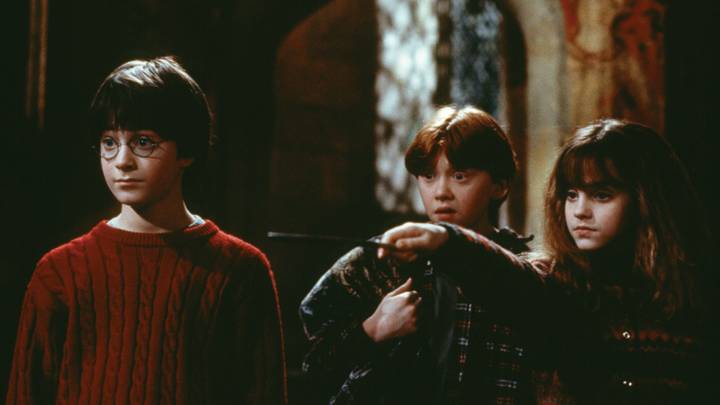 Harry Potter (Daniel Radcliffe), Ron Weasley (Rupert Grint), and Hermione Granger (Emma Watson) in Harry Potter and the Sorcerer's Stone. Harry Potter (Daniel Radcliffe), Ron Weasley (Rupert Grint), and Hermione Granger (Emma Watson) in Harry Potter and the Sorcerer's Stone.