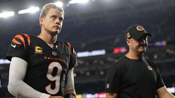 Cincinnati Bengals quarterback Joe Burrow and coach Zac Taylor walk off the field following a loss to the Washington Commanders on Sept. 23, 2024. Cincinnati Bengals quarterback Joe Burrow and coach Zac Taylor walk off the field following a loss to the Washington Commanders on Sept. 23, 2024.