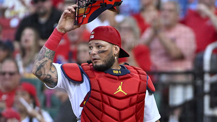 Aug 2, 2022; St. Louis, Missouri, USA; St. Louis Cardinals catcher Yadier Molina (4) looks on after throwing out Chicago Cubs center fielder Rafael Ortega (not pictured) during the first inning at Busch Stadium. Mandatory Credit: Jeff Curry-Imagn Images Aug 2, 2022; St. Louis, Missouri, USA; St. Louis Cardinals catcher Yadier Molina (4) looks on after throwing out Chicago Cubs center fielder Rafael Ortega (not pictured) during the first inning at Busch Stadium. Mandatory Credit: Jeff Curry-Imagn Images