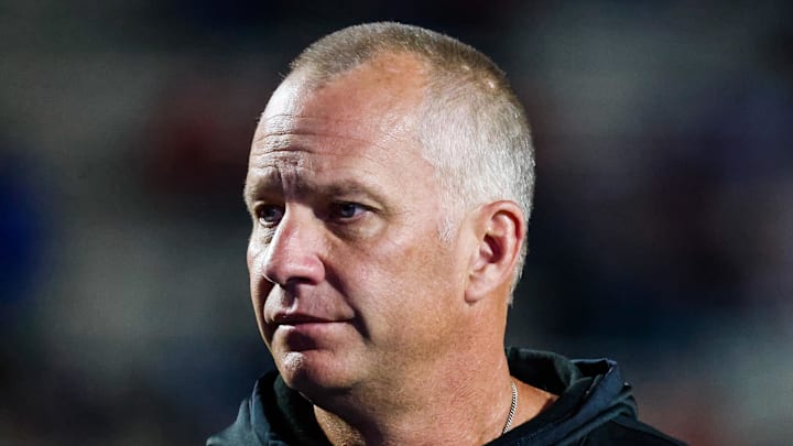 Oct 14, 2023; Durham, North Carolina, USA; North Carolina State Wolfpack head coach Dave Doeren looks on before the first half of the game against Duke Blue Devils at Wallace Wade Stadium. Mandatory Credit: Jaylynn Nash-Imagn Images