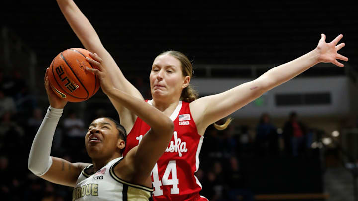 Purdue Boilermakers guard Jeanae Terry (10) is defended by Nebraska Cornhuskers center Maggie Mendelson (44) in 2023.