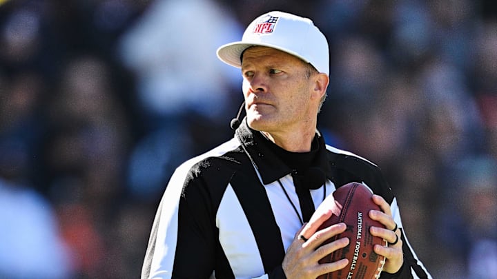 Oct 22, 2023; Chicago, Illinois, USA;  National Football League referee Clay Martin (19) officiates