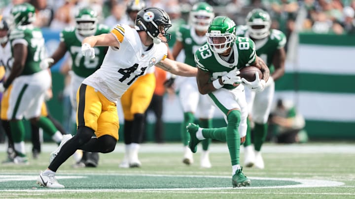 Sep 7, 2025; East Rutherford, New Jersey, USA; New York Jets wide receiver Josh Reynolds (83) fights for yards against Pittsburgh Steelers linebacker Payton Wilson (41) Sep 7, 2025; East Rutherford, New Jersey, USA; New York Jets wide receiver Josh Reynolds (83) fights for yards against Pittsburgh Steelers linebacker Payton Wilson (41)