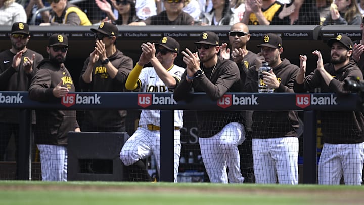 San Diego Padres starting pitcher Joe Musgrove (44) looks on alongside starting pitchers Michael King (34) and Dylan Cease (84) during the first inning against the San Francisco Giants at Petco Park on March 28, 2024.