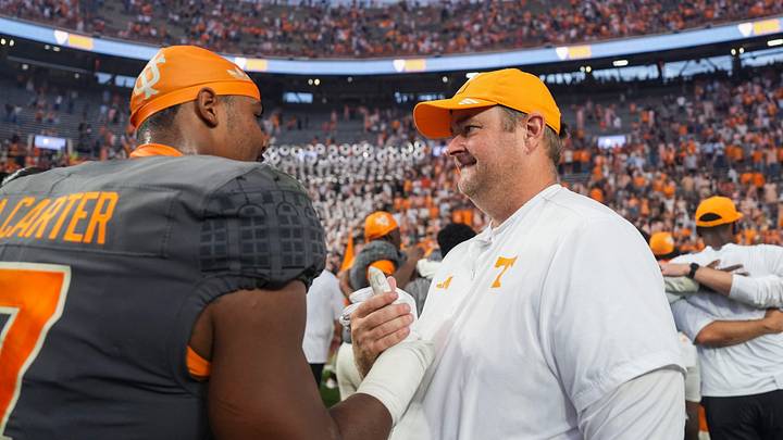 Tennessee coach Josh Heupel and Tennessee linebacker Arion Carter (7) celebrate after winning a college football game between Tennessee and Auburn at Neyland Stadium in Knoxville, Tenn., on Oct. 3, 2026. Tennessee coach Josh Heupel and Tennessee linebacker Arion Carter (7) celebrate after winning a college football game between Tennessee and Auburn at Neyland Stadium in Knoxville, Tenn., on Oct. 3, 2026.