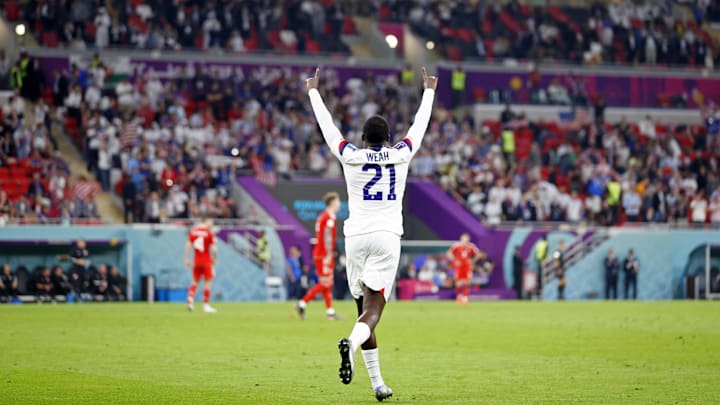 United States of America forward Timothy Weah (21) reacts after scoring the USMNT's lone goal in their 1-1 draw vs. Wales.