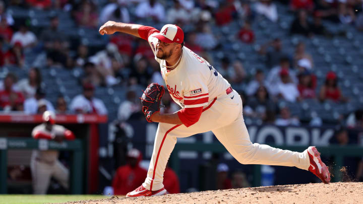 Jun 9, 2024; Anaheim, California, USA;  Los Angeles Angels relief pitcher Carlos Estevez (53) pitches during the ninth inning against the Houston Astros at Angel Stadium. Mandatory Credit: Kiyoshi Mio-USA TODAY Sports