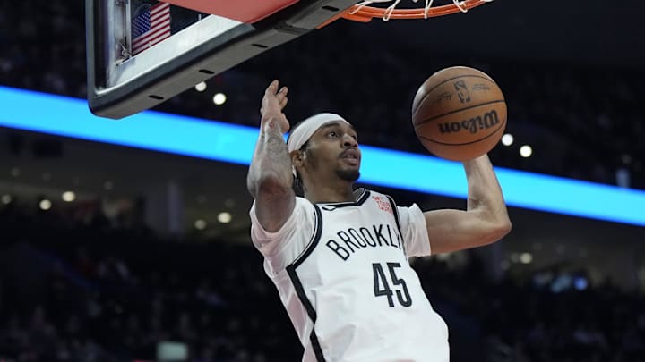 Jan 14, 2025; Portland, Oregon, USA; Brooklyn Nets guard Keon Johnson (45) dunks the ball during the first half against the Portland Trail Blazers at Moda Center. Mandatory Credit: Soobum Im-Imagn Images