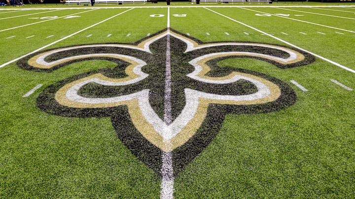 Oct 30, 2022; New Orleans, Louisiana, USA;  General view of the New Orleans Saints logo as the midfield logo fleur-de-lis after the game between the New Orleans Saints and the Las Vegas Raiders at Caesars Superdome. Mandatory Credit: Stephen Lew-Imagn Images