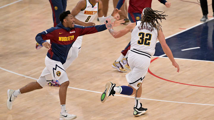 Apr 26, 2025; Inglewood, California, USA; Denver Nuggets forward Aaron Gordon (32) celebrates as he runs on the court after scoring the winning shot to defeat the Los Angeles Clippers 101-99 in game four of round one of the 2024 NBA Playoffs at Intuit Dome. Mandatory Credit: Jayne Kamin-Oncea-Imagn Images