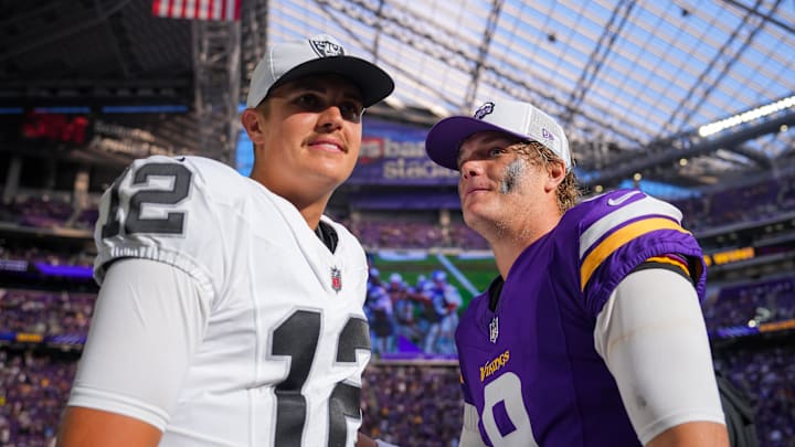 Aug 10, 2024; Minneapolis, Minnesota, USA; Minnesota Vikings quarterback J.J. McCarthy (9) and Las Vegas Raiders quarterback Aidan O'Connell (12) talk after the game at U.S. Bank Stadium. Mandatory Credit: Brad Rempel-Imagn Images