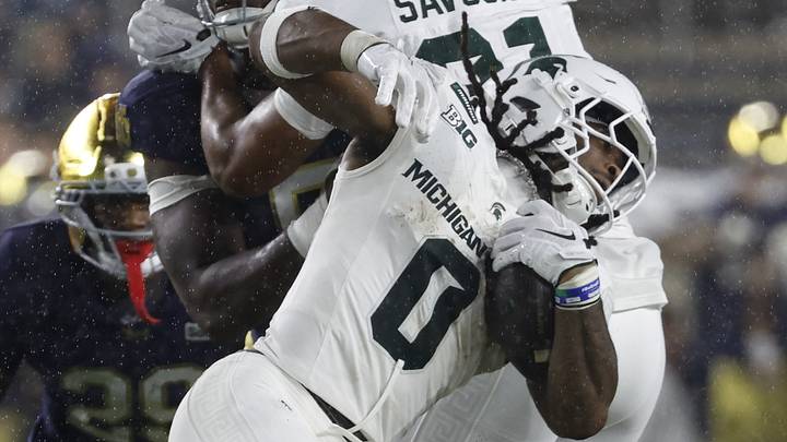 Sep 19, 2026; South Bend, Indiana, USA; Notre Dame Fighting Irish linebacker Kyngstonn Viliamu-Asa (27) tackles Michigan State Spartans running back Cam Edwards (0) during the first half at Notre Dame Stadium. Mandatory Credit: Michael Caterina-Imagn Images Sep 19, 2026; South Bend, Indiana, USA; Notre Dame Fighting Irish linebacker Kyngstonn Viliamu-Asa (27) tackles Michigan State Spartans running back Cam Edwards (0) during the first half at Notre Dame Stadium. Mandatory Credit: Michael Caterina-Imagn Images