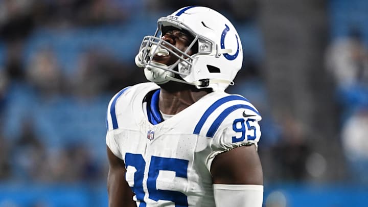Nov 5, 2023; Charlotte, North Carolina, USA; Indianapolis Colts defensive end Adetomiwa Adebawore (95) reacts after a sack in the fourth quarter at Bank of America Stadium. Mandatory Credit: Bob Donnan-Imagn Images Nov 5, 2023; Charlotte, North Carolina, USA; Indianapolis Colts defensive end Adetomiwa Adebawore (95) reacts after a sack in the fourth quarter at Bank of America Stadium. Mandatory Credit: Bob Donnan-Imagn Images