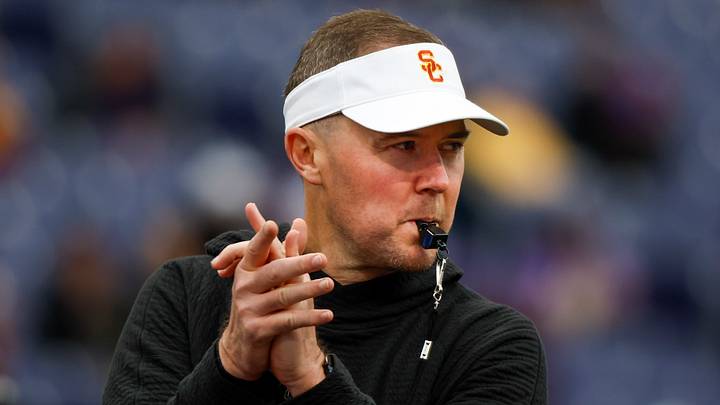 Nov 2, 2024; Seattle, Washington, USA; USC Trojans head coach Lincoln Riley watches pregame warmups against the Washington Huskies at Alaska Airlines Field at Husky Stadium. Mandatory Credit: Joe Nicholson-Imagn Images Nov 2, 2024; Seattle, Washington, USA; USC Trojans head coach Lincoln Riley watches pregame warmups against the Washington Huskies at Alaska Airlines Field at Husky Stadium. Mandatory Credit: Joe Nicholson-Imagn Images