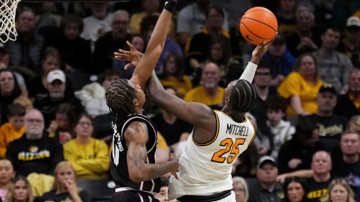 Jan 31, 2026; Columbia, Missouri, USA; Missouri Tigers guard Mark Mitchell (25) shoots as Mississippi State Bulldogs forward Jamarion Davis-Fleming (0) defends during the second half of the game at Mizzou Arena. Mandatory Credit: Denny Medley-Imagn Images Jan 31, 2026; Columbia, Missouri, USA; Missouri Tigers guard Mark Mitchell (25) shoots as Mississippi State Bulldogs forward Jamarion Davis-Fleming (0) defends during the second half of the game at Mizzou Arena. Mandatory Credit: Denny Medley-Imagn Images