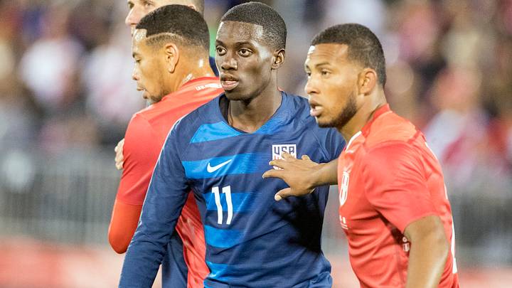 Tim Weah and Johan Madrid during a 2018 game between the USMNT and Peru. Tim Weah and Johan Madrid during a 2018 game between the USMNT and Peru.