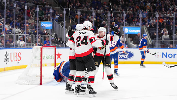 Apr 11, 2026; Elmont, New York, USA; Ottawa Senators center Dylan Cozens (24), right wing Drake Batherson (19), Ottawa Senators right wing Claude Giroux (28) and Ottawa Senators defenseman Jake Sanderson (85) celebrate a goal against the New York Islanders in the third period at UBS Arena. Mandatory Credit: Alexander Wohl-Imagn Images Apr 11, 2026; Elmont, New York, USA; Ottawa Senators center Dylan Cozens (24), right wing Drake Batherson (19), Ottawa Senators right wing Claude Giroux (28) and Ottawa Senators defenseman Jake Sanderson (85) celebrate a goal against the New York Islanders in the third period at UBS Arena. Mandatory Credit: Alexander Wohl-Imagn Images